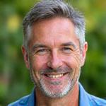 Michael, 48, looking relaxed outdoors