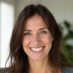 Sarah, 42, smiling confidently